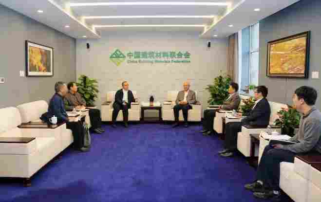 阎晓峰会见河南光远新材料董事长李志伟一行